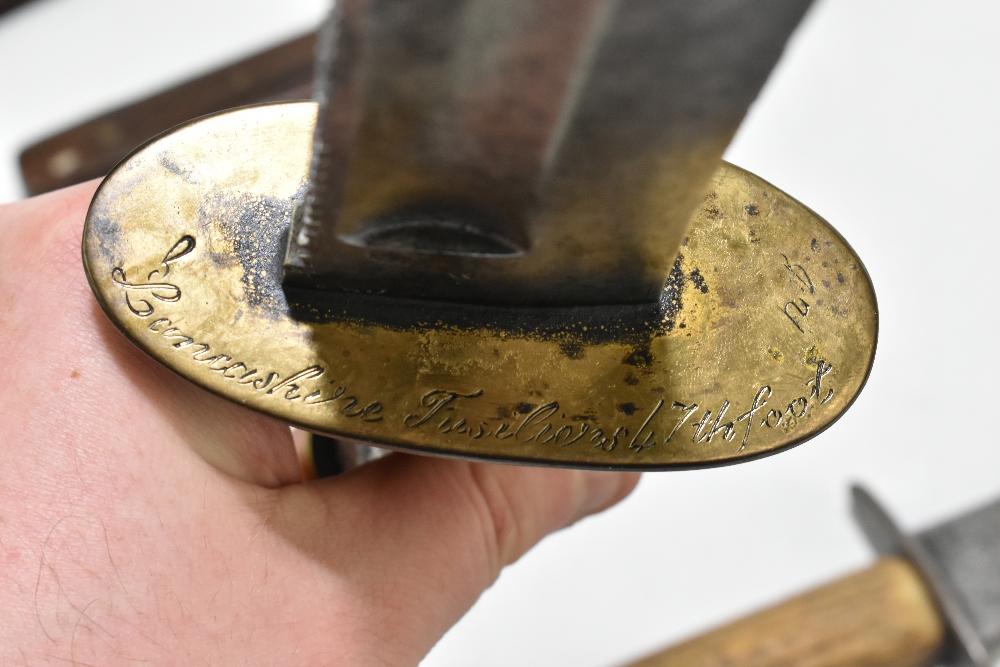 Four knives/daggers, the largest a sawback example with stamped marks to blade base, the brass guard - Image 10 of 11