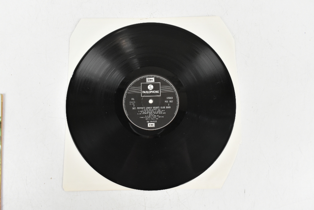 THE BEATLES; three vinyl LP records comprising ‘With the Beatles’, ‘Please Please Me’, ‘Sgt - Image 6 of 12