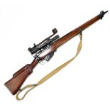 LEE ENFIELD; a no.4 Mk I .303 fully stocked bolt action rifle mounted with a telescopic sight