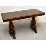 A Victorian walnut and faux grained walnut centre table, with rounded rectangular top on twin