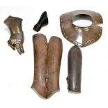 A group of steel armour sections comprising a collar with brass studs, a hinged vambrace, an