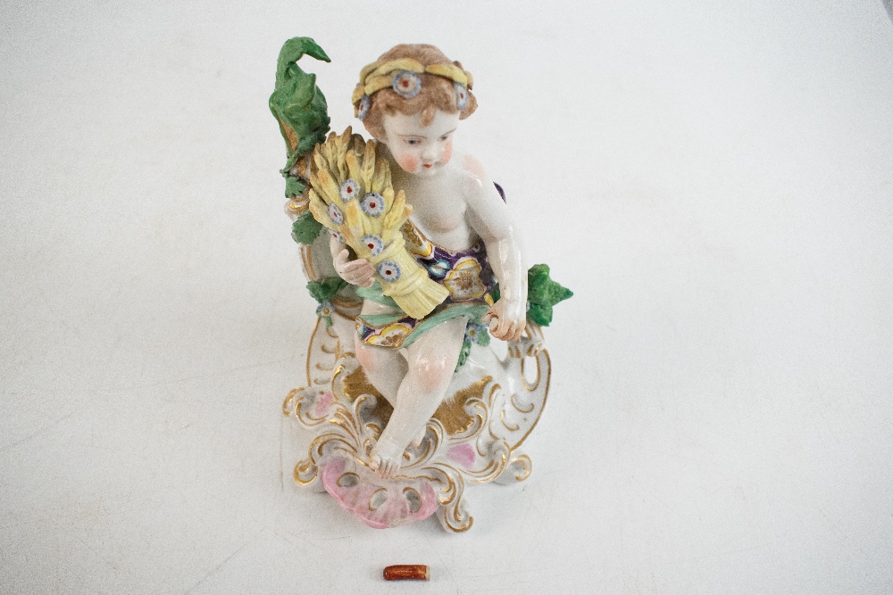 A 19th century porcelain figure decpicting a cherub representing harvest holding wheat sheaf, gilt - Image 4 of 6