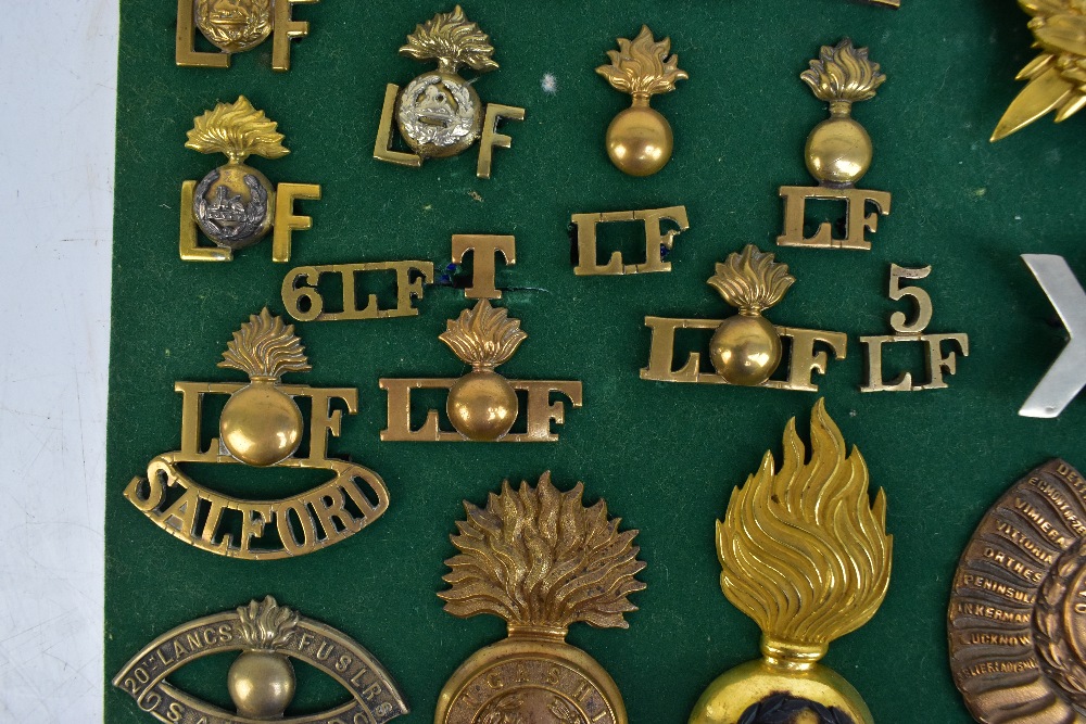 THE LANCASHIRE FUSILIERS; a good group of badges including a gilt helmet/shako plate for the 20th of - Image 4 of 10