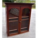 A Victorian mahogany bookcase top, the twin glazed doors enclosing three shelves, height 128cm,