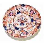 An early 20th century Japanese Imari charger with scalloped shaped rim, diameter 47cm.Additional