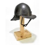 An English Cromwellian/Civil War period lobster tail helmet with hinged visor, three bar face