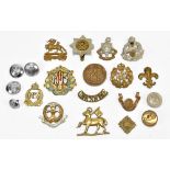 A small group of cap badges including New Zealand 'Onward', Royal Berkshire, Middlesex, RAF, etc,