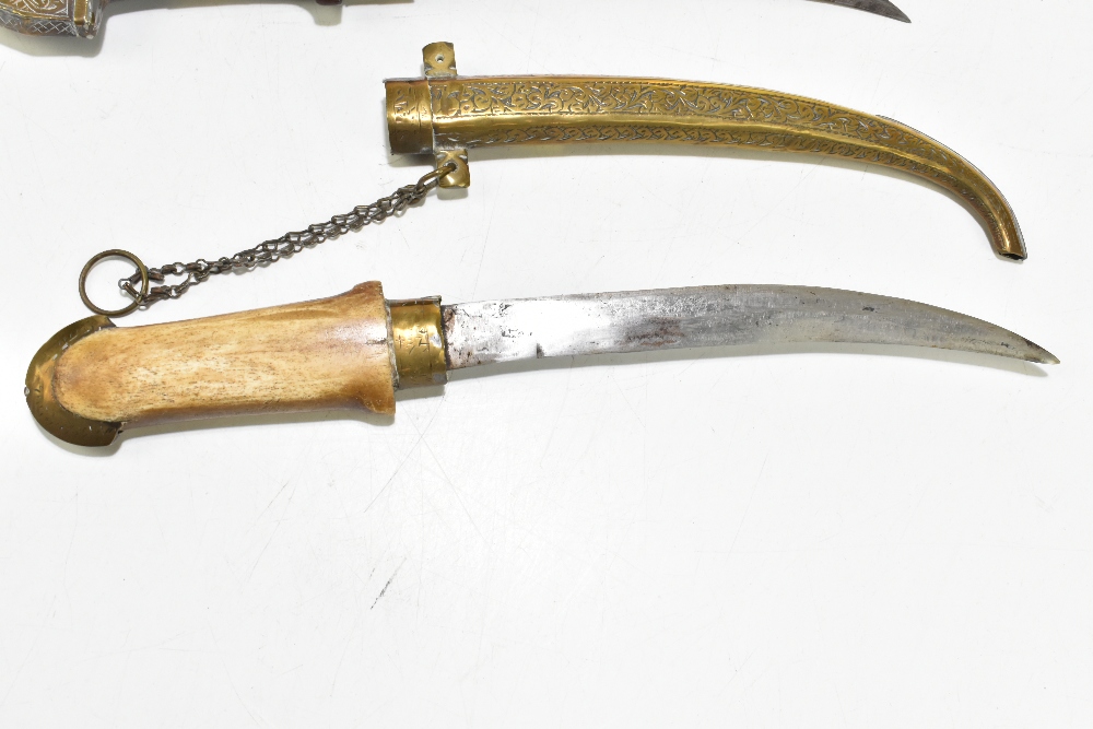 Two North East African/Middle Eastern jambiyas of typical form, both with brass scabbards, length of - Image 2 of 8