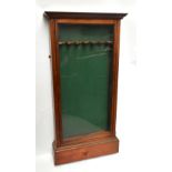 An early 20th century mahogany glazed gun display cabinet, with green baize lined interior and six