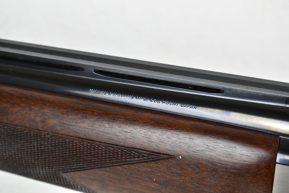 *****WITHDRAWN***** MIROKU; a boxed 7000 Sport Grade 1 over-and-under 12 bore shotgun with single - Image 12 of 16