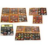 Approximately two hundred and thirty diecast model cars and vehicles including a wall mounted