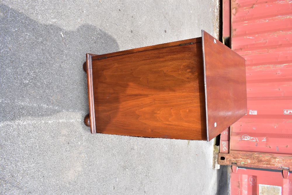 A linen cupboard with pair of panelled doors enclosing two slides, raised on bun feet, height - Image 3 of 6