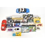 A collection of boxed and loose model vehicles with manufacturers including Burago, Lledo, Vanguards