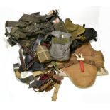 A group of military equipment including gas mask in small backpack, a set including water