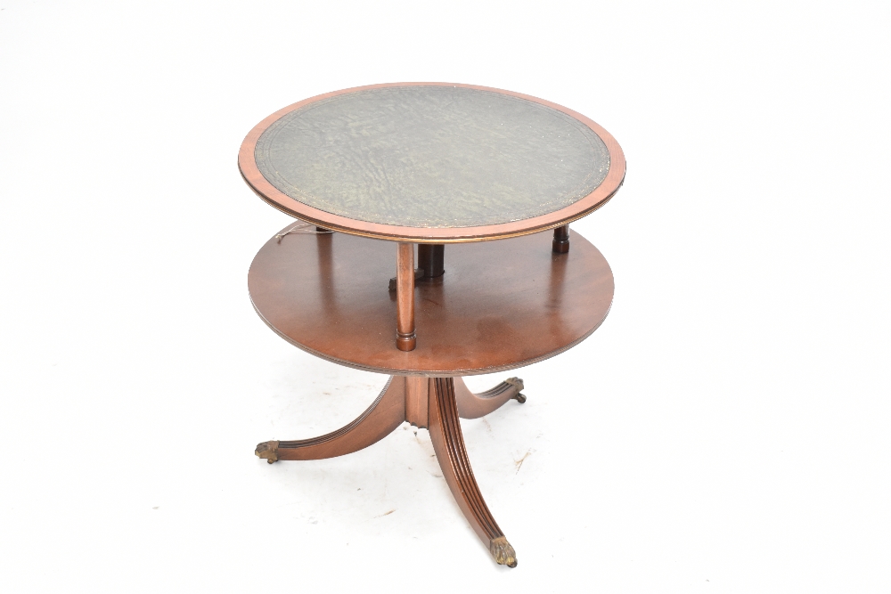 A reproduction mahogany veneered revolving bookcase/table, raised on outswept supports, diameter - Image 2 of 3