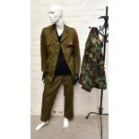 A No.2 dress military tunic with buttons and Tank Corps badges and trousers displayed on a mannequin