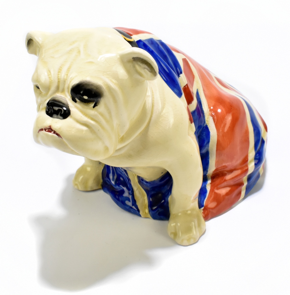 ROYAL DOULTON; a model of a seated bulldog draped in a Union Jack, no.645658, height 15cm, length