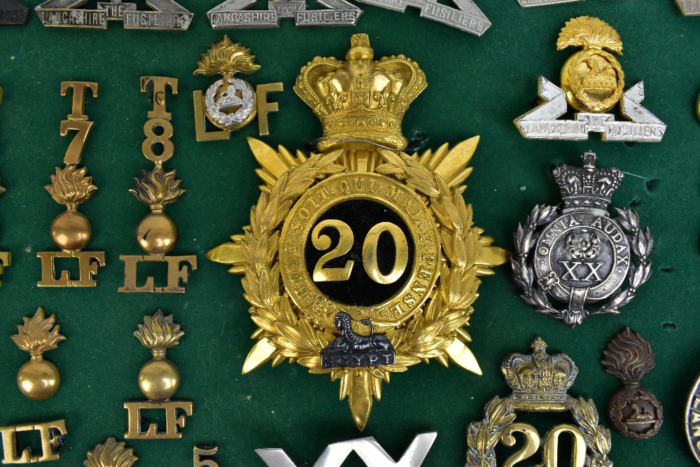 THE LANCASHIRE FUSILIERS; a good group of badges including a gilt helmet/shako plate for the 20th of - Image 2 of 10