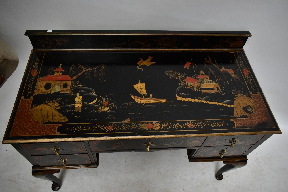 A early 20th century black lacquered kneehole writing table with gallery back, with chinoiserie - Image 2 of 5