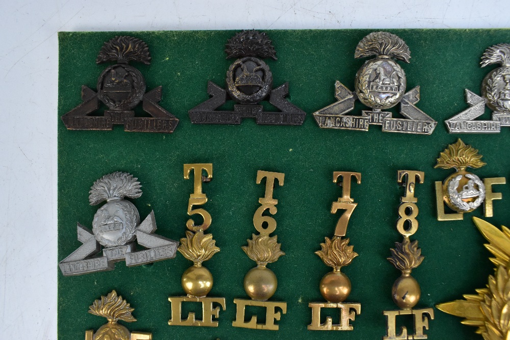 THE LANCASHIRE FUSILIERS; a good group of badges including a gilt helmet/shako plate for the 20th of - Image 3 of 10