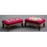 A near pair of early 20th century carved walnut footstools, of rectangular form with tapestry seats,