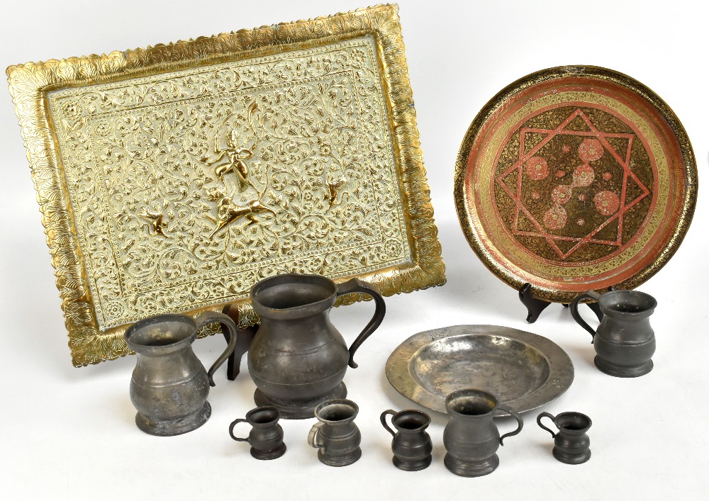 A mixed lot of assorted metalware including an Indian brass rectangular tray, Persian circular tray,