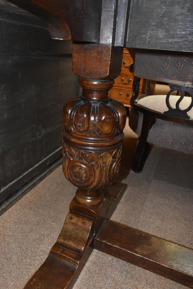 An early 20th century oak refectory type table with rectangular top on two carved baluster - Image 3 of 4