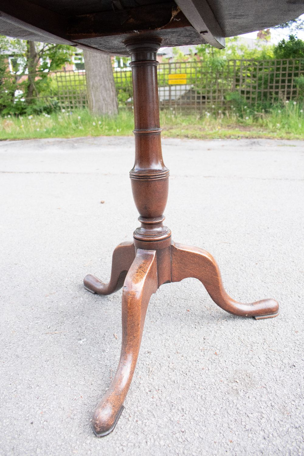 An early 19th century mahogany circular tilt top occasional table, the dished top with a moulded - Image 3 of 3