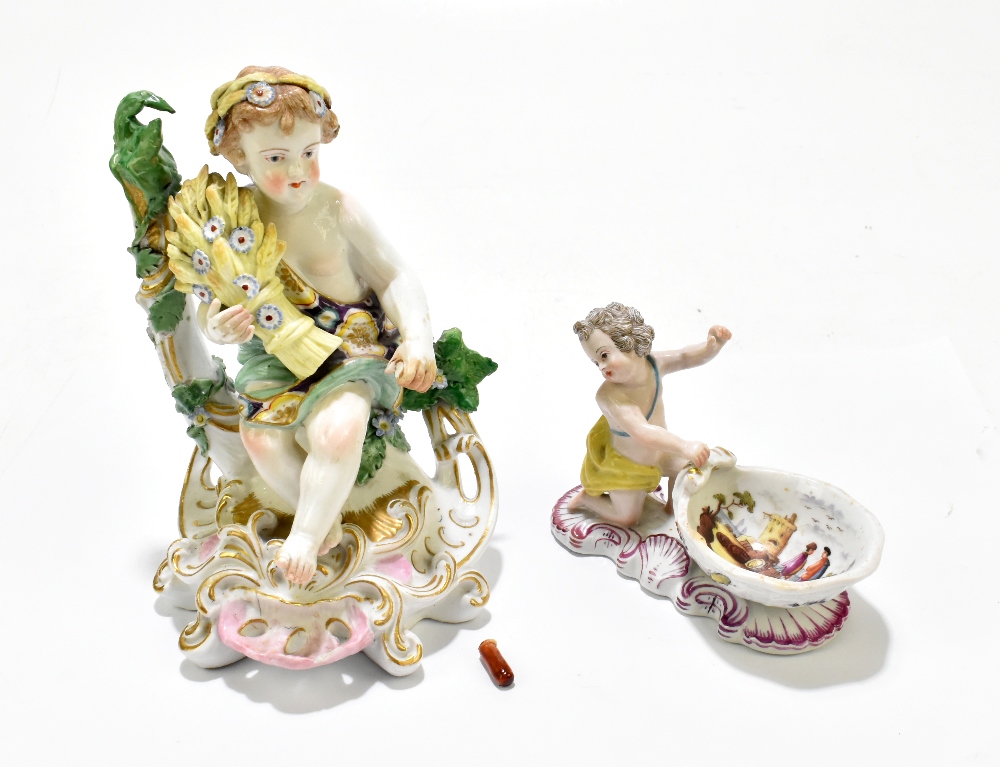 A 19th century porcelain figure decpicting a cherub representing harvest holding wheat sheaf, gilt