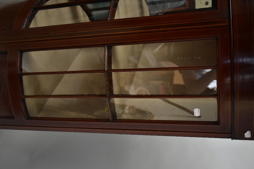 An Edwardian mahogany and boxwood inlaid bowfront display cabinet, with curved door enclosing two - Image 4 of 5