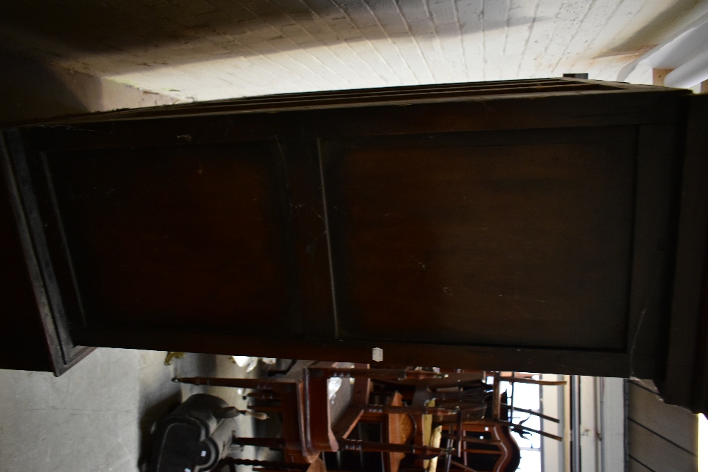 A 19th century oak cupboard on stand, the twin panelled doors an arrangement of hooks, above two - Image 3 of 4