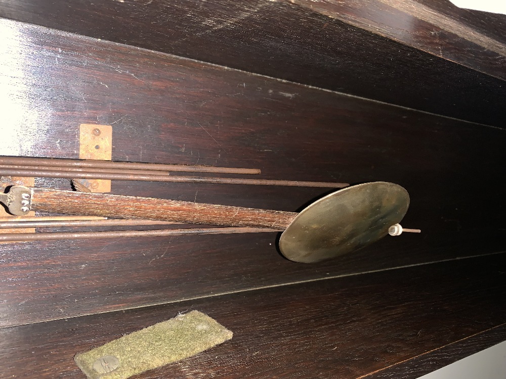 An early 20th century oak cased longcase clock of small proportions, the brass face with applied - Image 5 of 5