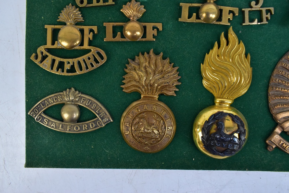 THE LANCASHIRE FUSILIERS; a good group of badges including a gilt helmet/shako plate for the 20th of - Image 5 of 10