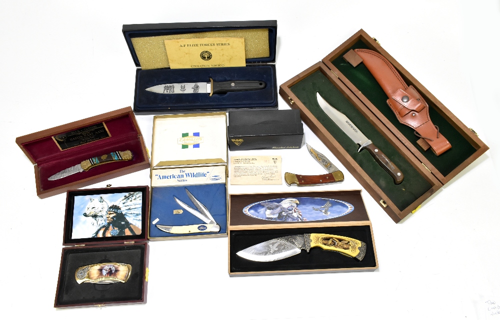 A group of boxed/cased collector's knives with two limited edition examples, including a limited
