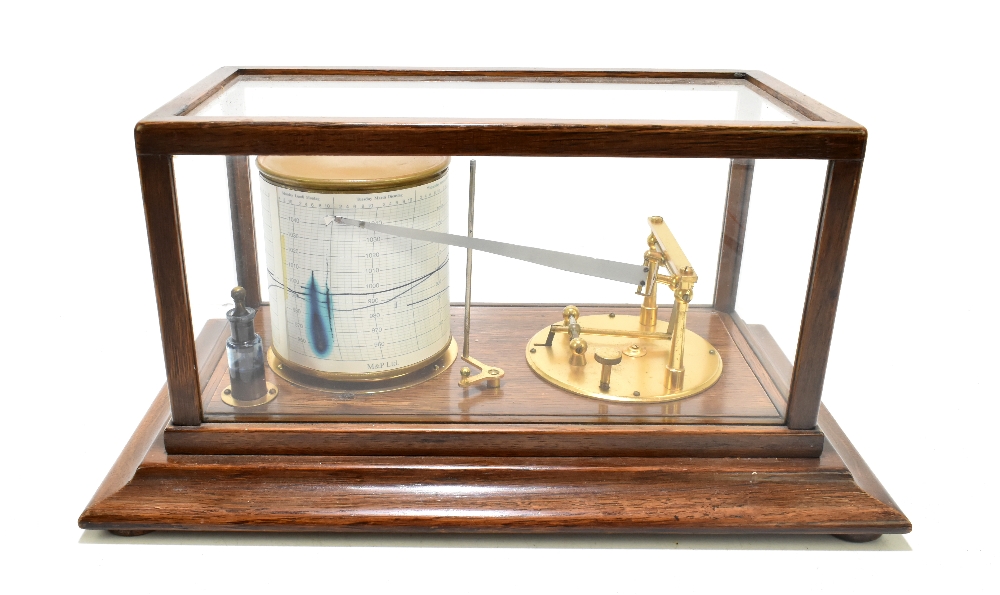 An early/mid-20th century clockwork barograph in glazed case, the case 17.7 x 37 x 22cm.Additional