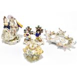 A late 19th century Continental floral encrusted porcelain inkstand, of Rococo style, modelled