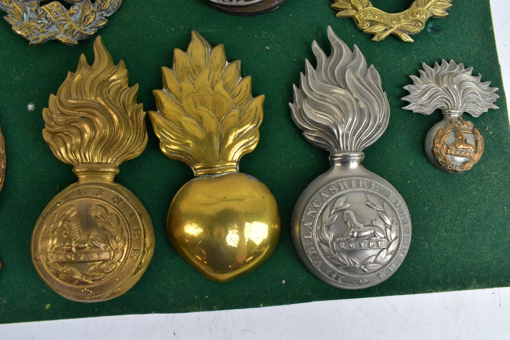 THE LANCASHIRE FUSILIERS; a good group of badges including a gilt helmet/shako plate for the 20th of - Image 10 of 10