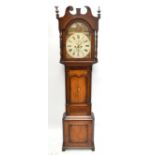 A late George III inlaid oak eight day longcase clock, the painted dial with Roman numerals and