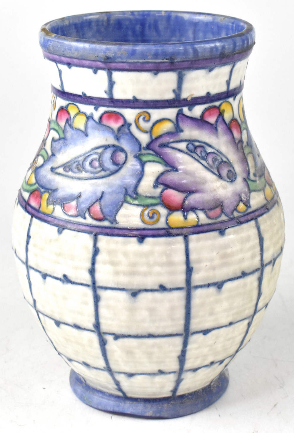 An early 20th century Charlotte Rhead baluster vase with abstract floral and fruit decoration to