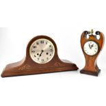 An Edwardian inlaid mahogany mantel clock, the painted dial set with Roman numerals,