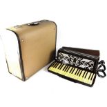 A Galanti bass accordion in brown and cream case with diamanté decoration,