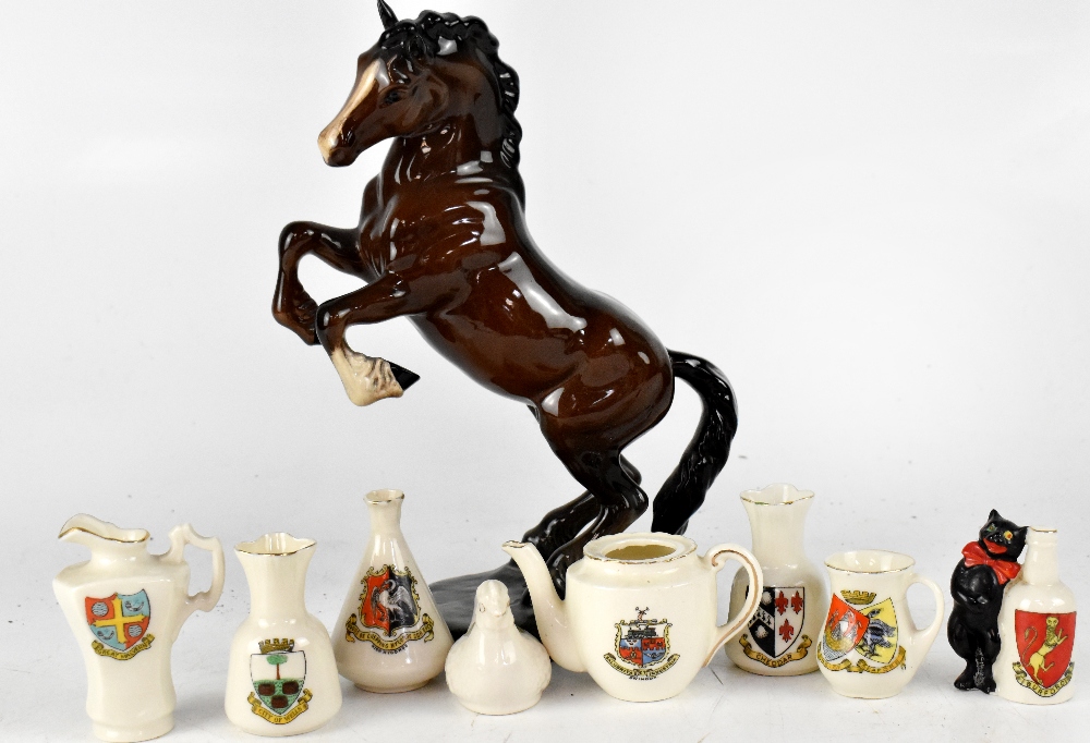 A quantity of crested ware to include Goss, Swan China, Arcadian China, in the form of vases,