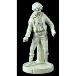 A late 19th/early 20th century Parian ware figure of a young man in colloquial Victorian garb,