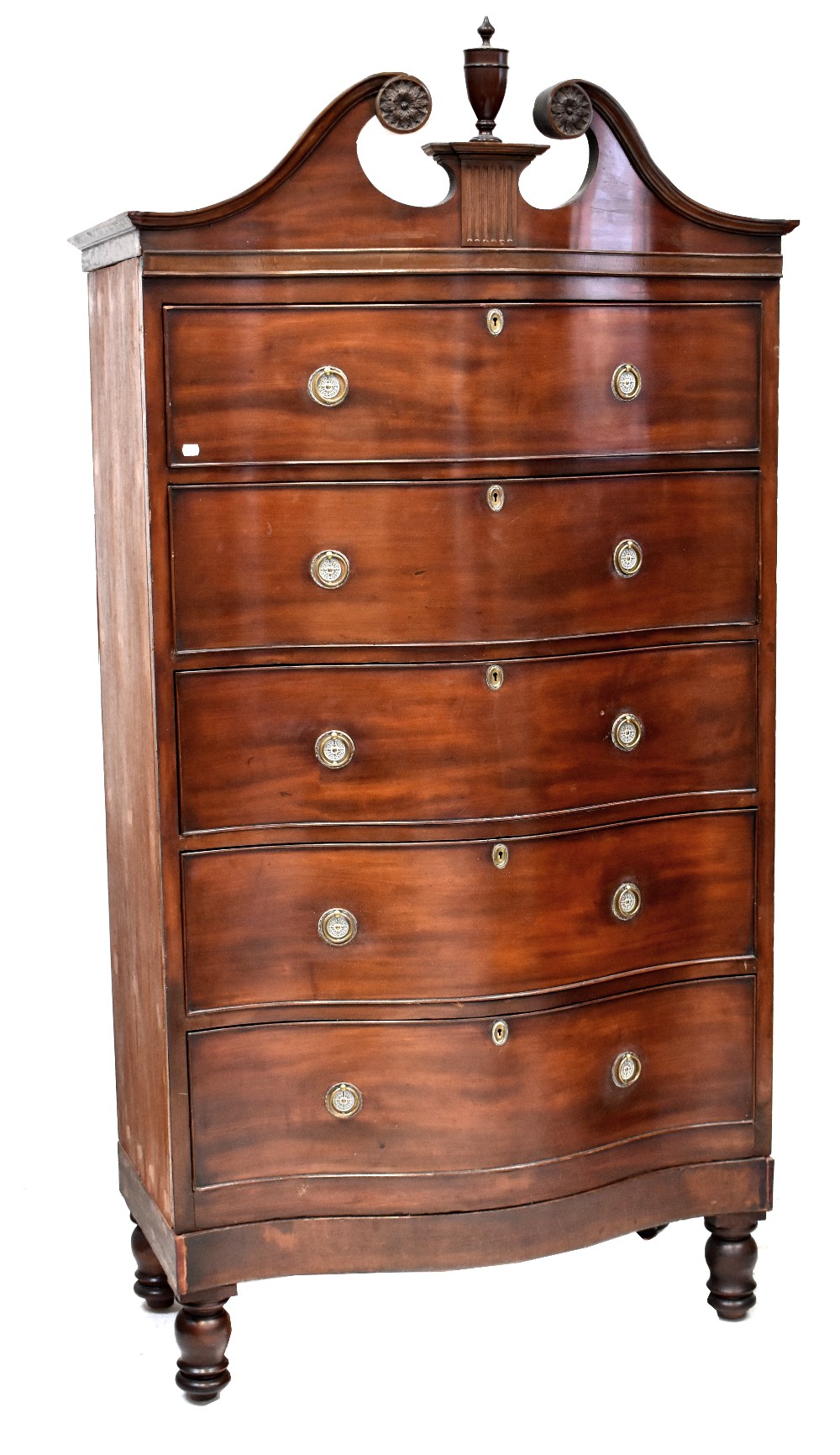 An American 19th century mahogany serpentine tall chest of five long drawers,