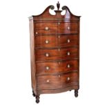 An American 19th century mahogany serpentine tall chest of five long drawers,