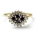 A vintage 9ct diamond and sapphire cluster ring,