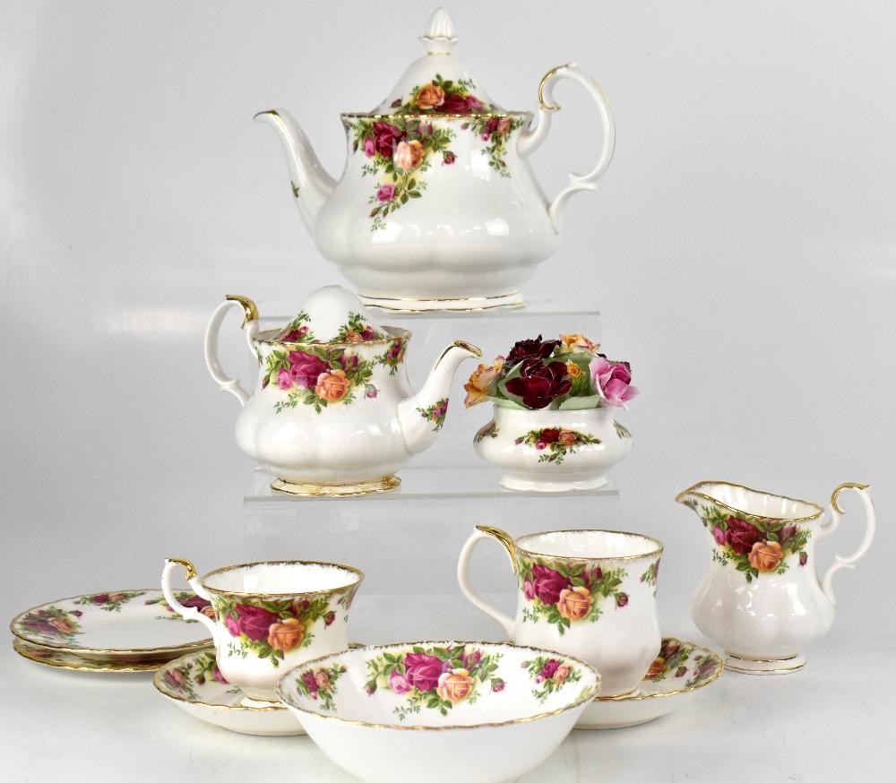 A quantity of Royal Albert 'Old Country Roses' to include tea and dinner ware, plates, side plates,
