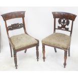 A pair of Victorian flame mahogany bar back dining chairs with drop-in seats,