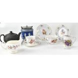 A collection of Wedgwood ceramics comprising a black basalt ware teapot,