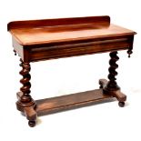 A Victorian mahogany wash stand with gallery back above a cushion drawer,